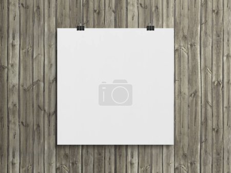 Photo for Blank squared poster hanging with clips on a wood wall Mockup. Empty frame 3D rendering - Royalty Free Image