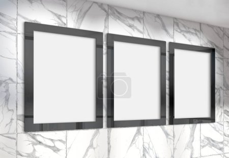 Foto de Tres marcos verticales Mockup colgando en la pared de la oficina. Burla de vallas publicitarias en el interior de la empresa moderna de mármol 3D renderizado - Imagen libre de derechos