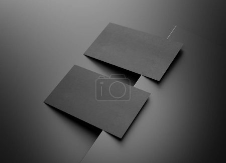 Foto de Dos tarjetas de visita negras burlándose. Plantilla texturizada de tarjeta de visita en una superficie cuadrada oscura. Renderizado 3D - Imagen libre de derechos