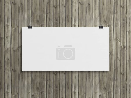Photo for Blank horizontal poster hanging with clips on a wood wall Mockup. Empty frame 3D rendering - Royalty Free Image