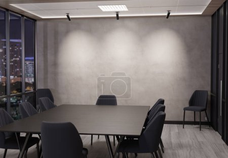 Photo for Empty concrete office wall mockup at night with modern wooden furnitures and spotlights. 3D rendering - Royalty Free Image