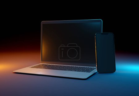 Foto de PARÍS - Francia - 15 de marzo de 2023: Recién estrenado Apple Macbook Air e Iphone 14, color Plata. Vista lateral. 3d representación de la pantalla del ordenador portátil maqueta sobre fondo oscuro - Imagen libre de derechos