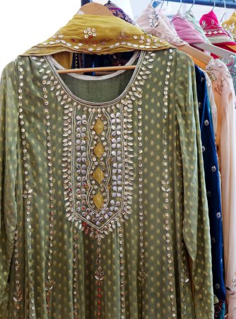 Foto de Close-up of indian woman fashion dress salwar kameez in display of shop - Imagen libre de derechos