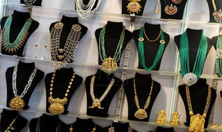  Close-up view of Indian traditional jewelry in display bof a shop                              