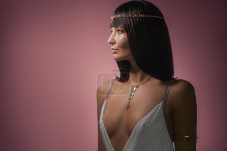 Photo for Fashion Stylish Beauty Portrait with Black Long Haircut and Professional Make-Up of Cleopatra. Beautiful Girls Face Close-up. High quality conceptual photo - Royalty Free Image