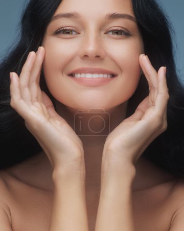 A beautiful smiling woman with perfect teeth, highlighting the importance of dental care and oral hygiene. Ideal for use in dental clinic promotions, whitening treatments, and health campaigns.