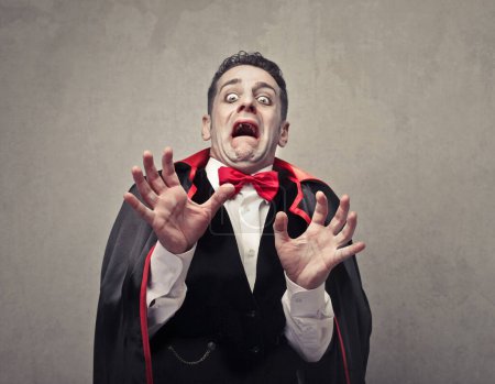 Photo for Man disguised as a scared vampire - Royalty Free Image