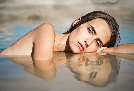 Photo for Portrait of young woman in the sea water - Royalty Free Image