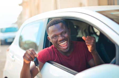 Photo for Happy young man on a car - Royalty Free Image