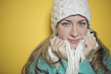 Photo for Young woman with hat and scarf - Royalty Free Image