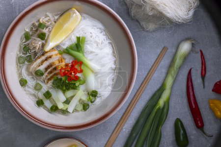 Photo for Pho soup with chicken meat and vegetables - Royalty Free Image