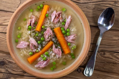 Photo for Smoked meat soup with vegetables and rice - Royalty Free Image