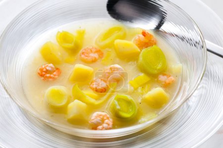 Photo for Leek soup with potatoes and shrimps - Royalty Free Image