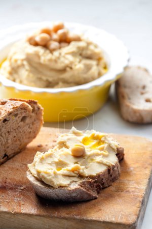 Photo for Still life of hummus with bread - Royalty Free Image