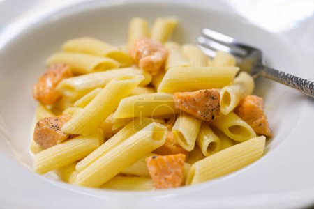 Photo for Pasta penne with salmon and lemon sauce - Royalty Free Image