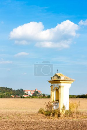 Photo for Palace in Jaroslavice with calvary chapel, Czech Republic - Royalty Free Image