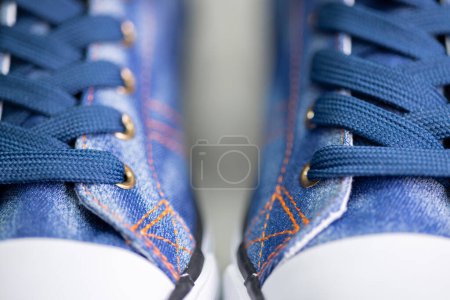 Foto de Close up of denim sneakers - Imagen libre de derechos