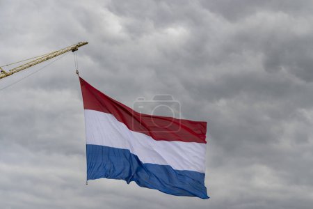 Téléchargez les photos : Dutch flag hoisted on a national holiday - en image libre de droit