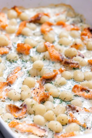 Photo for Potato gnocchi with salmon and dill sauce - Royalty Free Image