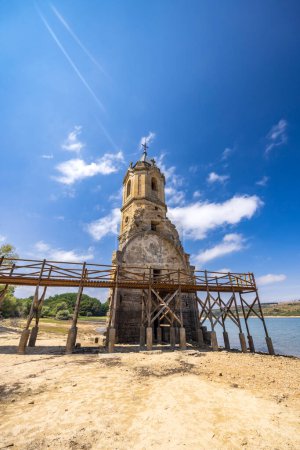Photo for Swamped church of San Roque near Villanueva de las Rozas, Cantabria, Spain - Royalty Free Image