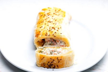 Photo for Puff pastry filled with salmon, dill and cream cheese - Royalty Free Image