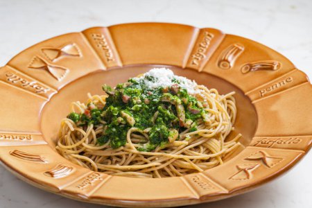 Photo for Spaghetti with spinach leaves, bacon and parmesan cheese - Royalty Free Image