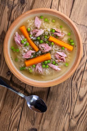 Photo for Smoked meat soup with vegetables and rice - Royalty Free Image