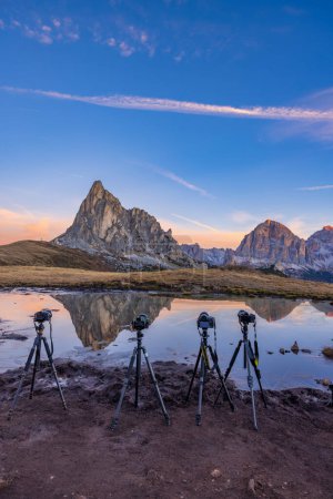 Photo for Camera on a tripod in the landscape, Giau Pass (Passo Giau), Dolomites Alps, South Tyrol, Italy - Royalty Free Image