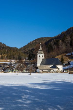 Photo for Landscape with church (Cerkev Rozenvenske Marije) near Bohinjska Bistrica, Slovenia - Royalty Free Image