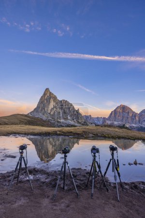 Photo for Camera on a tripod in the landscape, Giau Pass (Passo Giau), Dolomites Alps, South Tyrol, Italy - Royalty Free Image