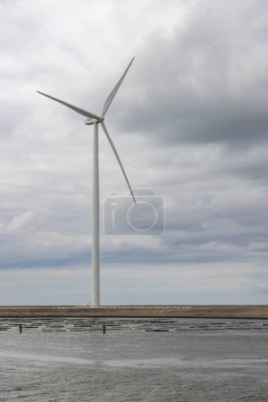 Photo for Wind turbines on edge of  national park Oosterschelde, Domburg - Vrouwenpolder, The Netherlands - Royalty Free Image