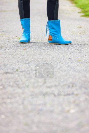 Photo for Young woman wearing fashionable boots - Royalty Free Image