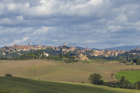 Photo for Typical Tuscan landscape withr Siena town, Tuscany, Italy - Royalty Free Image