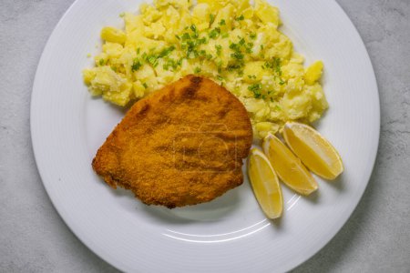 Photo for Chicken cutlet with couscous and lemon - Royalty Free Image