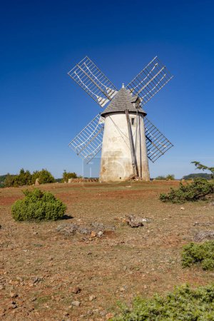 Photo for Windmill (Le Moulin de Redounel), La Couvertoirade in Larzac, Aveyron, France - Royalty Free Image