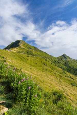 Photo for Puy Mary (1783 m) with road, Cantal, Auvergne-Rhone-Alpes region, France - Royalty Free Image