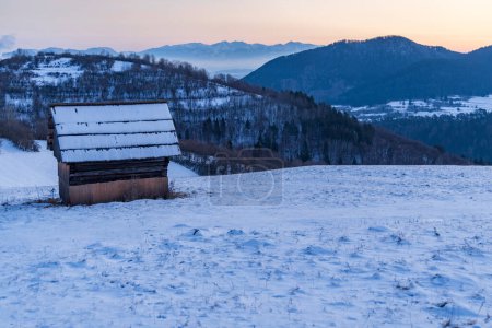 Photo for Winter landscape with hayloft in Velka Fatra, Slovakia - Royalty Free Image