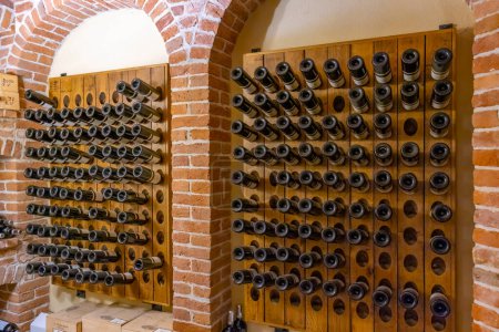 Stored wine bottles, wine cella, Canale, Piedmont, Italy