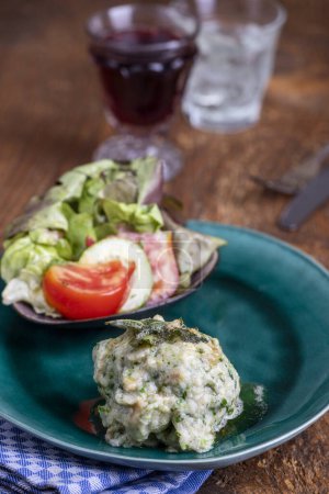Photo for Rustic spinach dumpling with salad - Royalty Free Image
