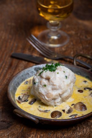 Photo for Bread dumpling in mushroom sauce - Royalty Free Image
