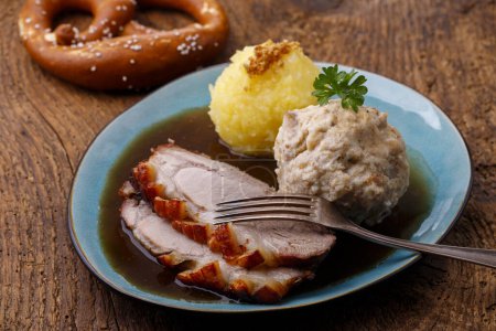 Photo for Bavarian roasted pork with dumplings - Royalty Free Image