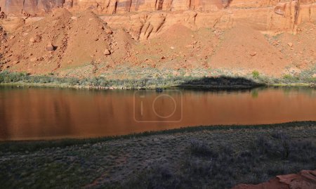Photo for A fishing boat on the Colorado river on the north half of Horseshoe Bend.  Located just outside of Page, Arizona. - Royalty Free Image