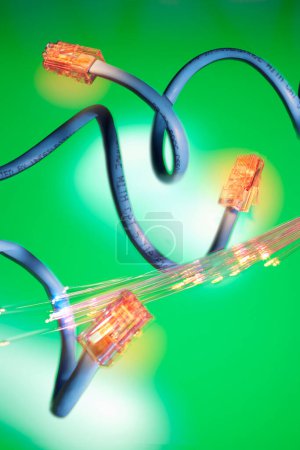 Photo for Network cable; wire; wiring; lead; cord; plug; connection; component; optical fibres; fibers; glass fibres; glass fibers; optics; light; guide; reflection; waveguide; science; technology; physics; engineering; telecommunication; communication; networ - Royalty Free Image