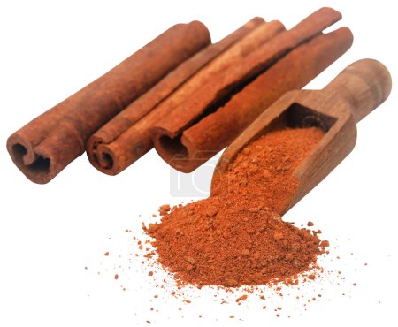 Photo for Bunch of some fresh aromatic cinnamon with ground powder in a wooden scoop - Royalty Free Image
