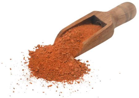 Photo for Cinnamon ground powder in a wooden scoop - Royalty Free Image
