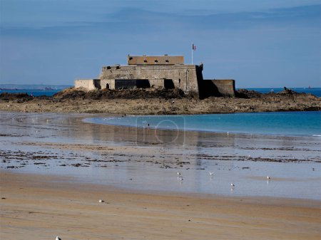 Fort National at Saint Malo in France accessible on foot at low tide. Saint-Malo is a French commune located in Brittany, in the department of Ille-et-Vilaine, on the north coast of Brittany 