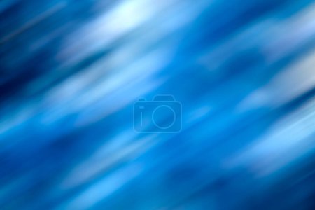 Téléchargez les photos : Fond bleu et papier peint flou en mouvement dynamique pour la décoration et le design - en image libre de droit