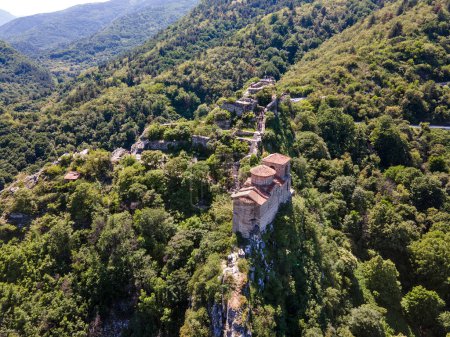 Aerial Spring view of Church of the Holy Mother of God at ruins of Medieval Asen Fortress, Asenovgrad, Plovdiv Region, Bulgaria