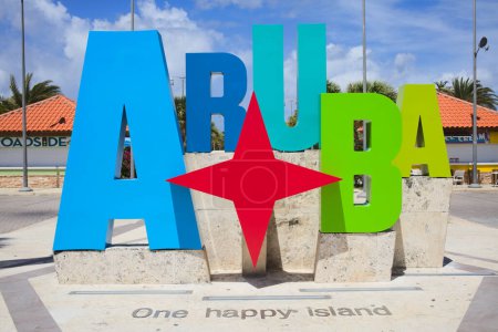 Photo for ORANJESTAD, ARUBA - JULY 17, 2022: Colorful Aruba sign with the slogan One Happy Island at Plaza Turismo at Surfside Beach in Oranjestad on the Caribbean island of Aruba - Royalty Free Image