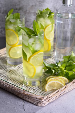 Photo for Basil Lemon Gin and Tonic, very light, incredibly refreshing cocktail. - Royalty Free Image